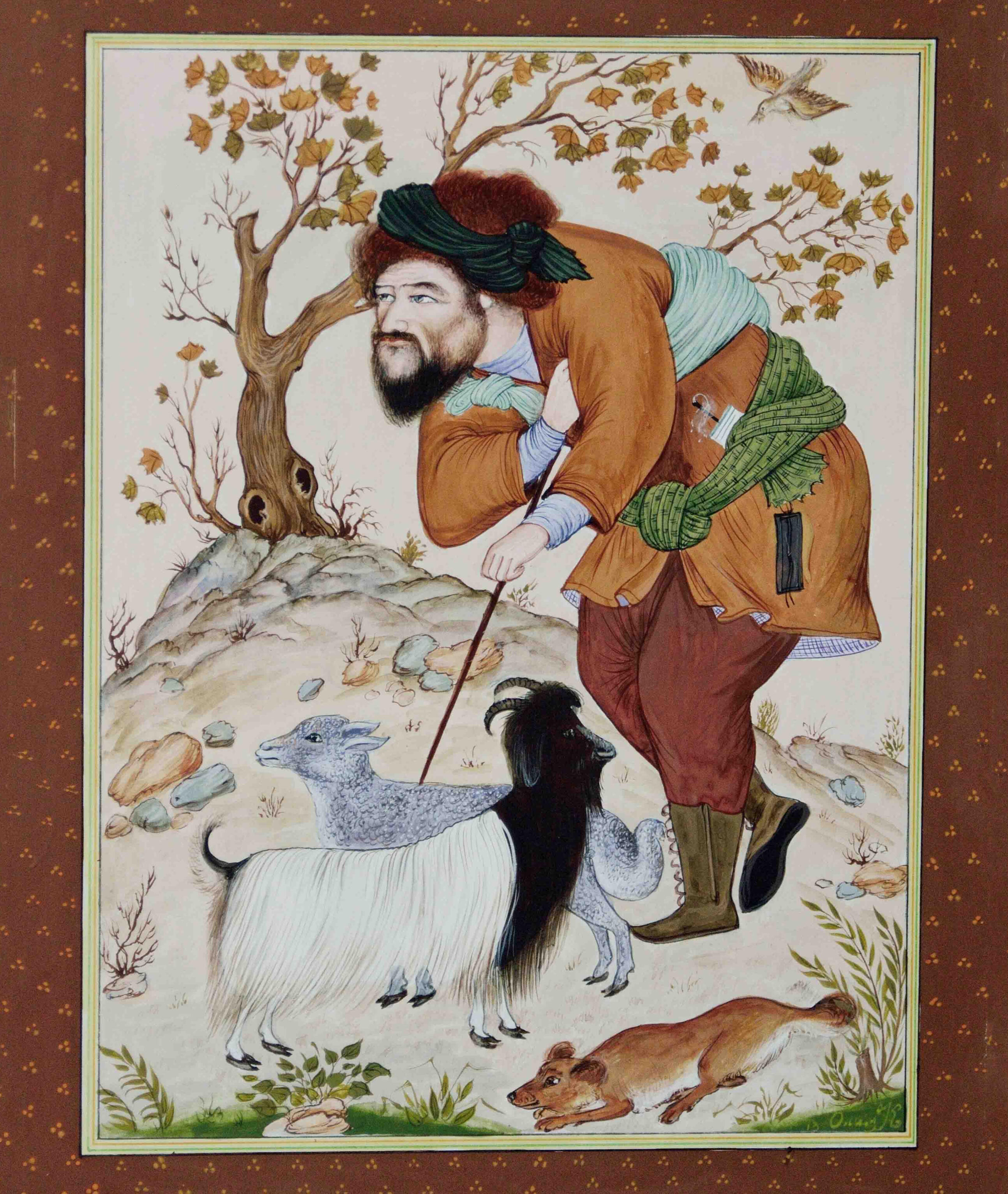 Olim Kamolzoda is the Honoured Artist of the Republic of Tajikistan. Photo of Olim Kamolzoda sitting at the desk in his workshop. He is the Honoured Artist of the Republic of Tajikistan, a Member of the Union of Artists of the Republic of Tajikistan, and a Specialist of the Miniature Art. Studying the specifics of the work
